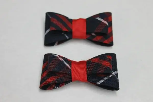 pair of PIGTAIL BOWS PLAID 36 black and red color