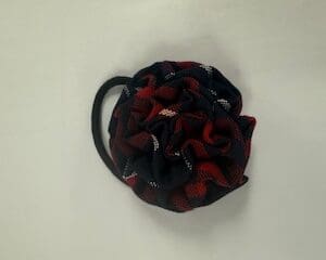 Black and red scrunchie on white background.