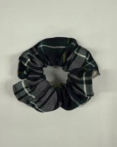 Plaid fabric scrunchie on white background.